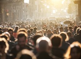 Blurred crowd of unrecognizable at the street